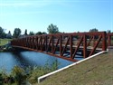 Erected by Acts II Construction:This LAFA project included the construction of a 240 foot single span pedestrian bridge spanning the Oswegatchie River connecting Harry L. Mills Memorial Park with the Riverview Recreation Park