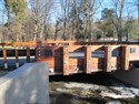 Douglas fir stress laminated, longitudinal deck bridge, penta treated. Somerset County, NJ